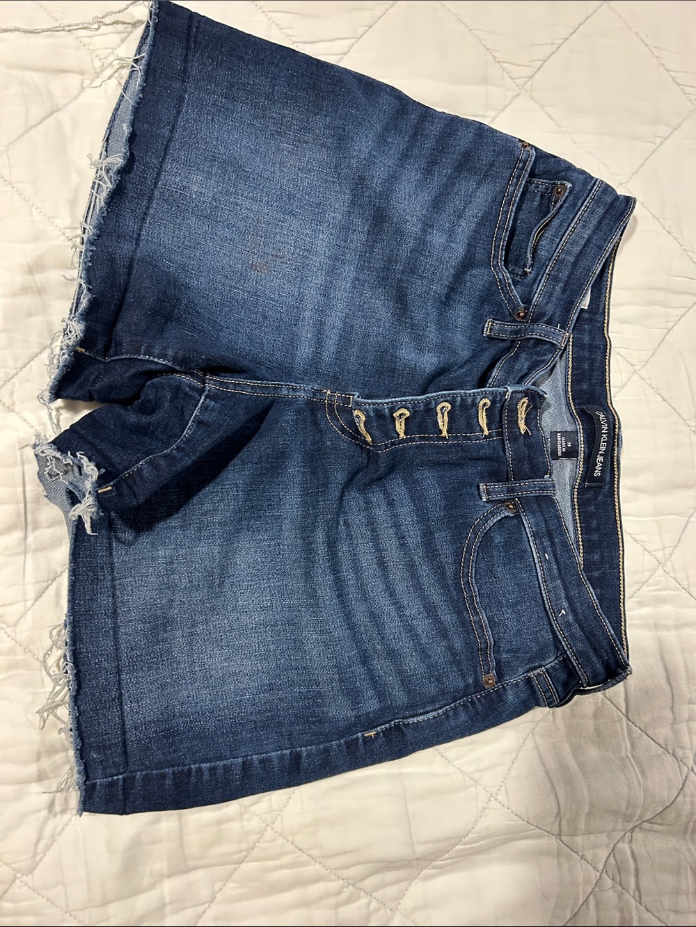 Calvin Klein Medium Blue Button Fly Frayed Hem Denim Shorts